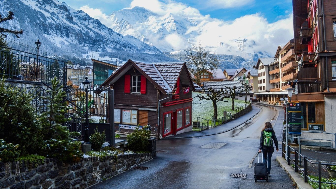 Scenic view of the Swiss Alps mountains showcasing rugged terrain and shifting alpine weather