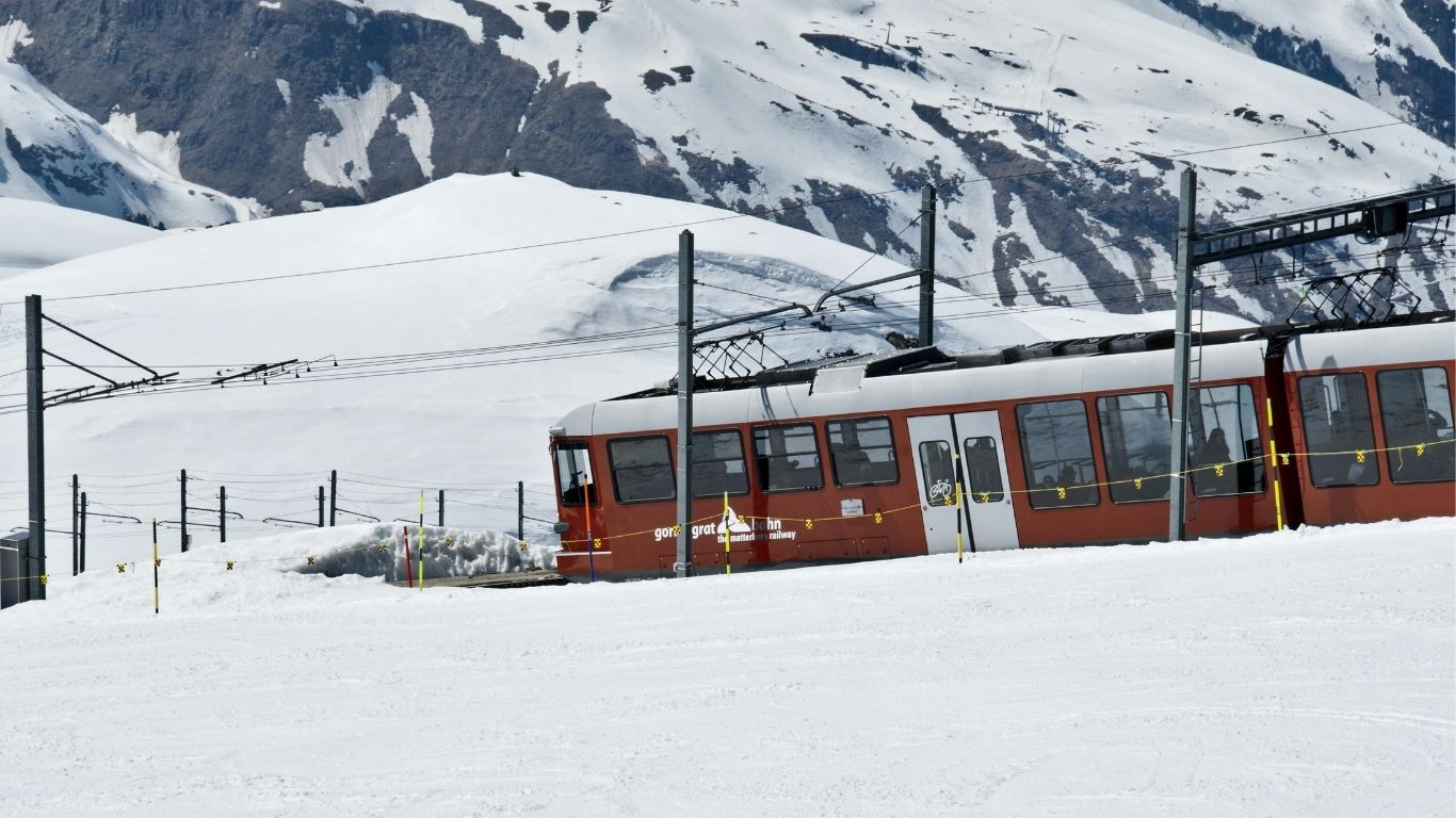 A spectacular Swiss panoramic train winding through stunning alpine mountains and pristine valleys